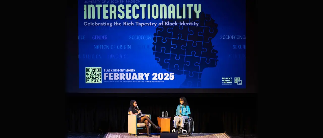 Event photo for UW–Madison’s Black History Month: the campaign title on a large screen above the keynote stage.