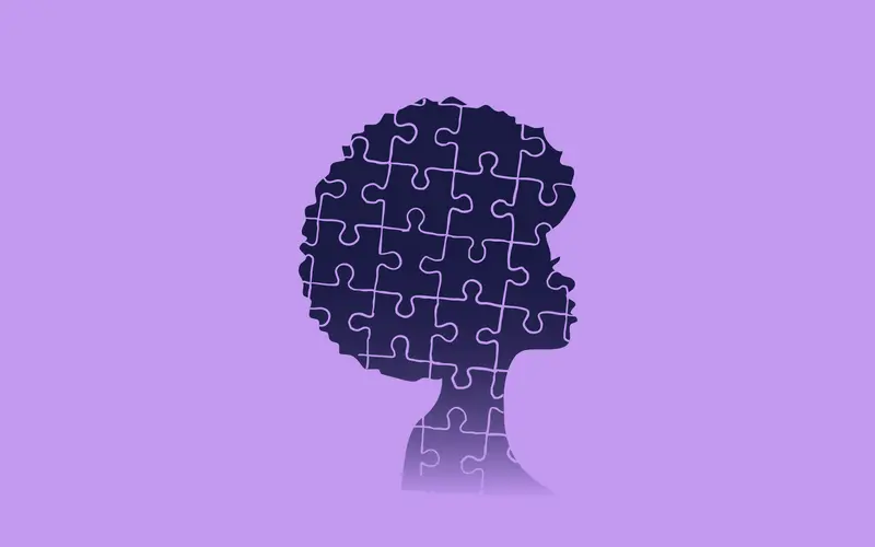 Campaign motif for UW–Madison’s Black History Month: a profile silhouette assembled from puzzle pieces, on lilac.