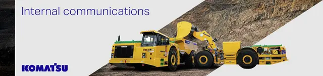 Email banner for Komatsu: “Internal communications” on a grey panel beside a loader on a diagonal.