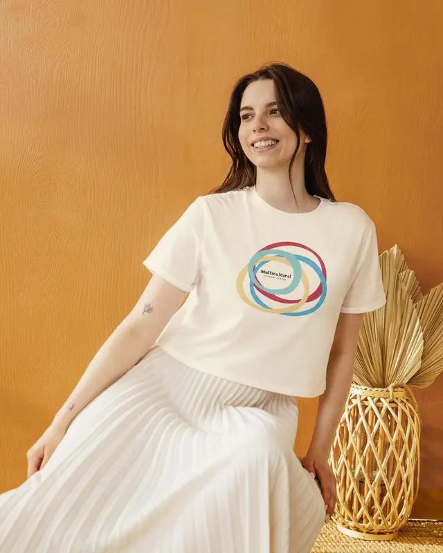 Team merchandise for the Multicultural Student Center: a cream shirt with the four-circle graphic.