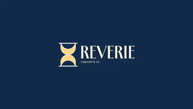 Primary logo for Reverie Capsule & Co.: the hourglass mark and wordmark in sun and cream on midnight.